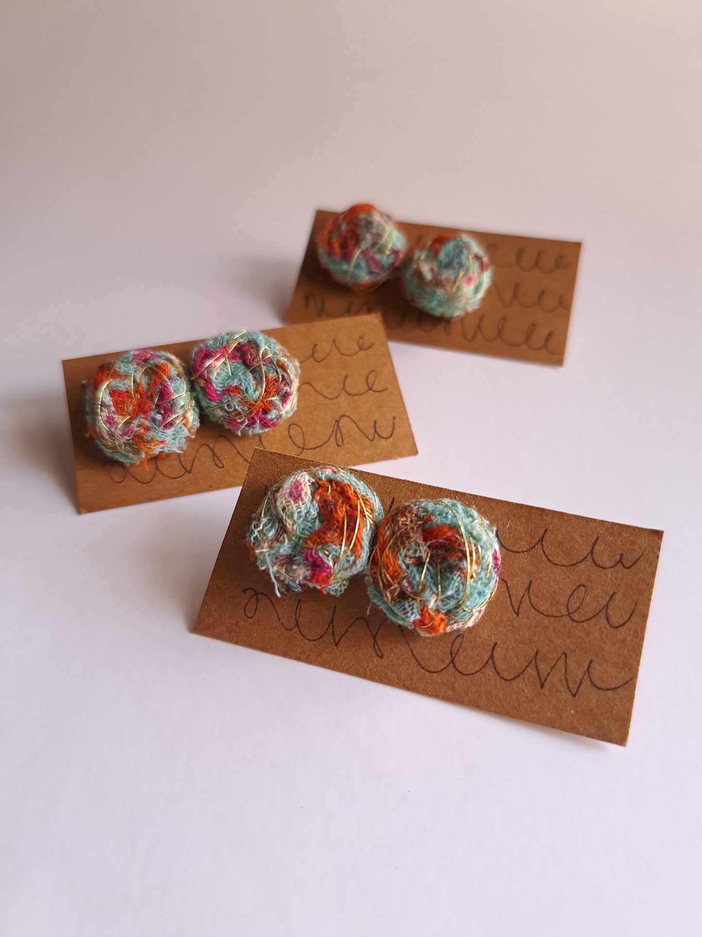 FLORAL WOVEN EAR STUDS